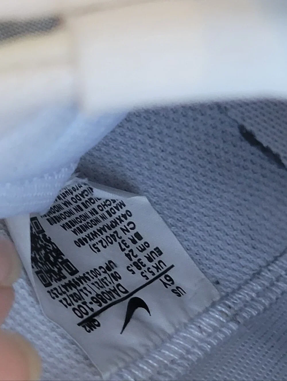 Nike White High-Top Blazers Sneakers with Black Swoosh and Red Tongue Tag